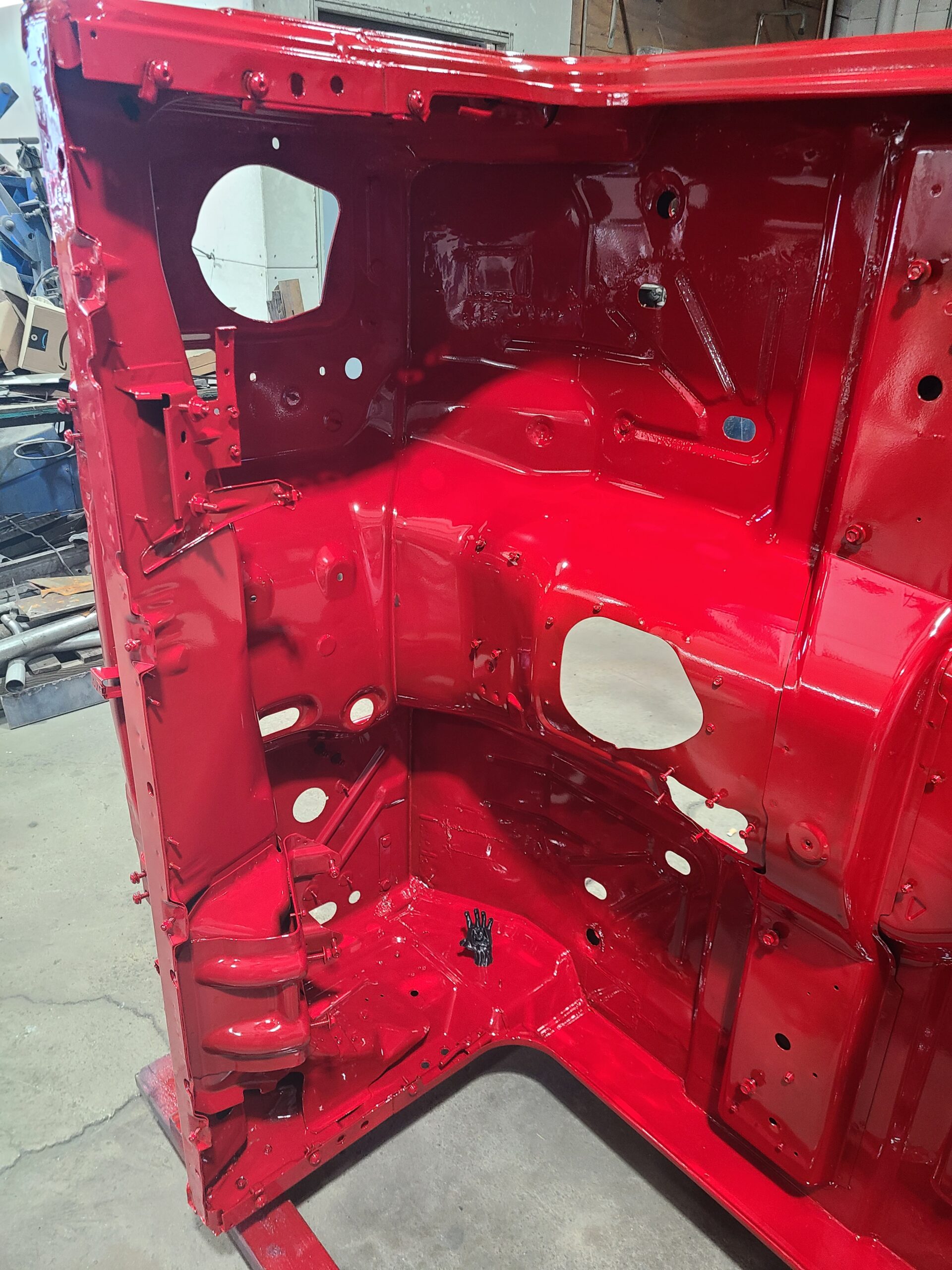 Red coated panel and floor section